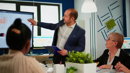 Business Presentation in Modern Office with Colleagues