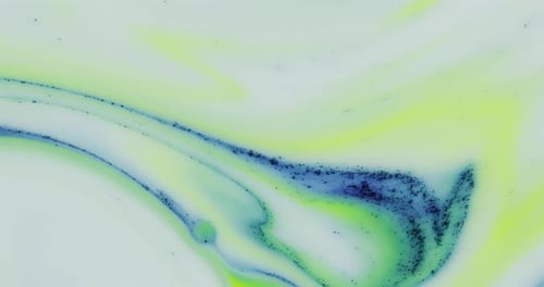 Abstrakter psychedelischer Hintergrund. Langsame Bewegung der Tinte in einer mehrfarbigen Flüssigkeit