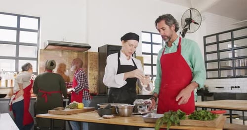 Chefs making pasta together