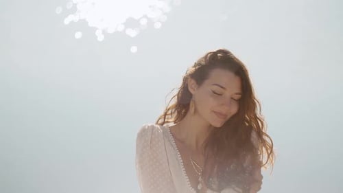 Woman Resting on the Beach During Vacation