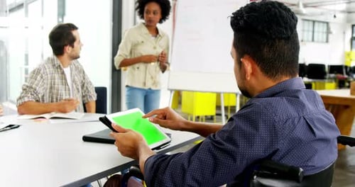 Inclusive Team Meeting in Modern Office with Technology