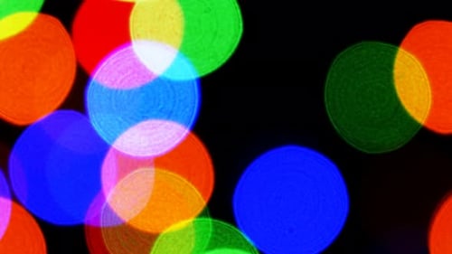 Abstract Multicolored Bokeh Lights on Black Background