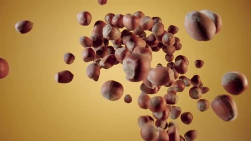 Explosion of Dried Kernel Hazelnuts on Yellow Studio Background