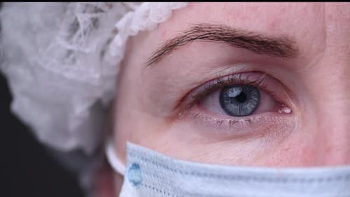 Close Up of Health Worker with Surgical Mask