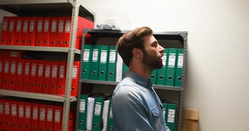 Executive holding files