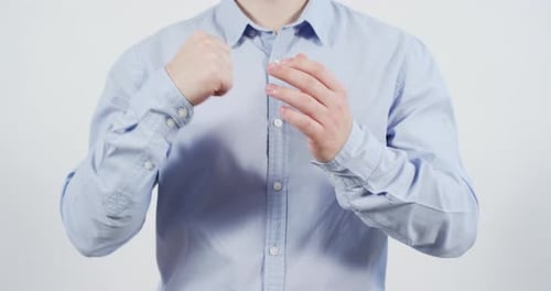 Adult Rubbing Knuckles and Fists Together