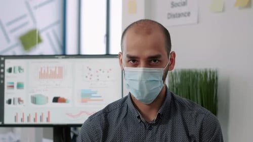 Man Wearing Mask in Urban Workplace