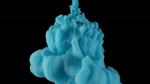 Turquoise Paint Swirling Abstractly in Water
