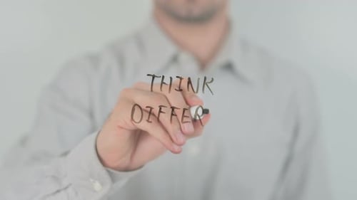 Writing Think Different on Glass Surface