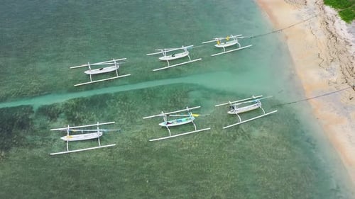 Coast and Fishing Boats as A Background from Top View. Bali Island, Indonesia. Travel — Video