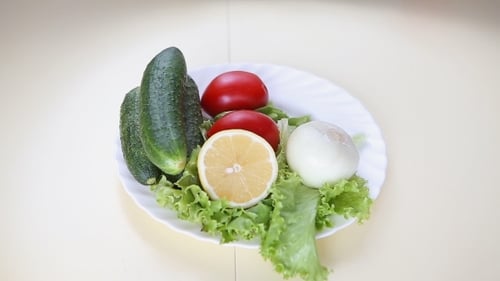 Fresh Salad Ingredients on Plate with Lemon