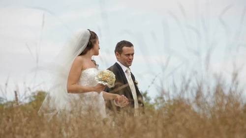 Newly Weds In A Field