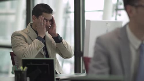 A Hispanic Man Works In A Attractive Modern Office (4 Of 4)