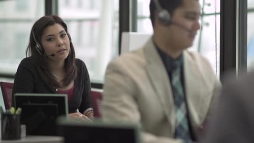 A Mixed Race Woman Works In A Attractive Modern Call Center (1 Of 6)