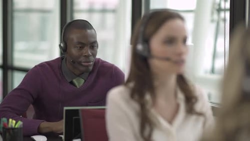 A Black Man Works In A Attractive Modern Call Center (2 Of 4)