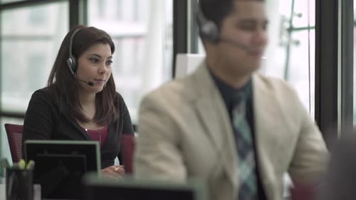 A Mixed Race Woman Works In A Attractive Modern Call Center (5 Of 6)