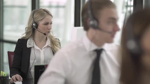 Blonde Caucasian Woman Works In A Attractive Modern Call Center (1 Of 3)