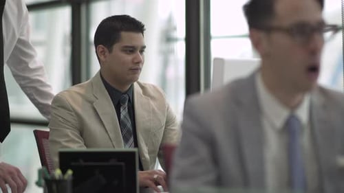 A Hispanic Man Works In A Attractive Modern Office (2 Of 4)