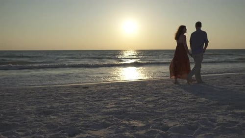 Couple Walking On Beach At Sunset (7 Of 23)