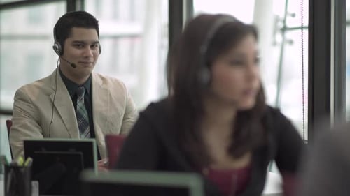 Hispanic Man Works In A Attractive Modern Call Center (2 Of 4)