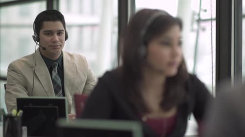 Hispanic Man Works In A Attractive Modern Call Center (3 Of 4)