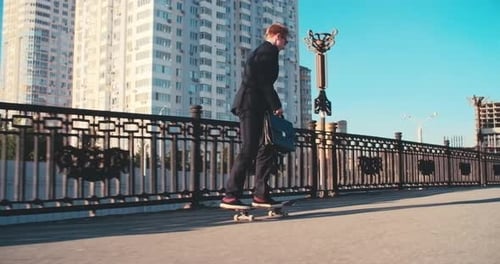 Businessman on Skateboard