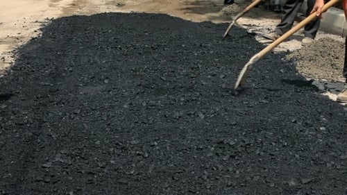 Laying Asphalt Road