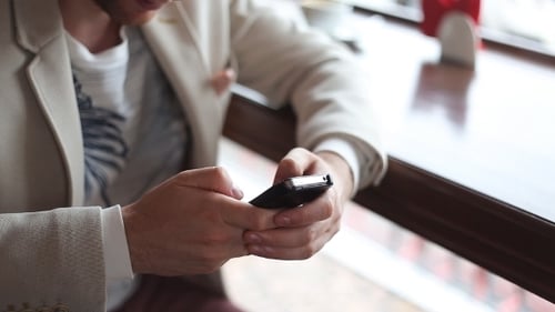 Close Up Of a Man Using Mobile Smart Phone