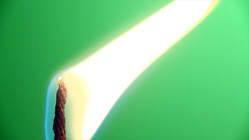 Flame burning on green chroma key background