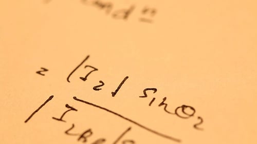 Complex Math Equations Written on Paper Close Up