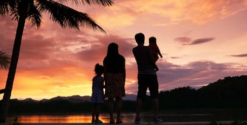 Asian Family At Sunset