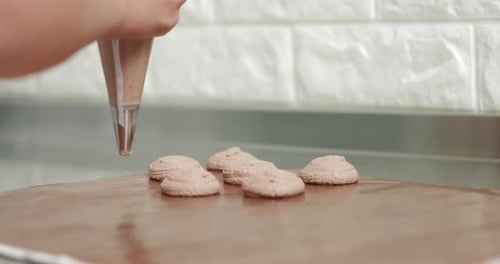 Chef Making Base for Preparation Macaron Dessert
