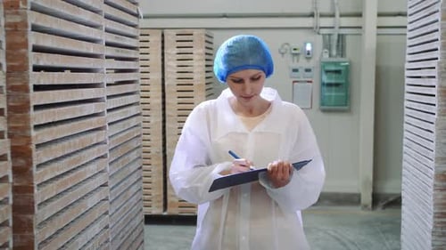 Controller Checking Factory Storage Room