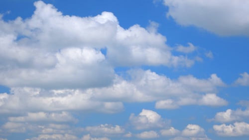 Clouds Moving in a Clear Blue Sky