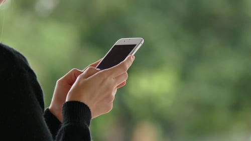 Adult Using Smartphone in Natural Setting