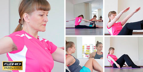 Women Doing Core Exercises in Fitness Studio