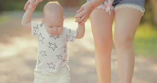 Baby Steps with Gentle Parental Guidance Outdoors