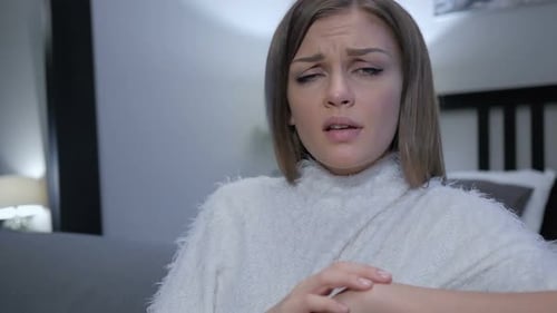 Reacting to Loss Casually Sitting Woman