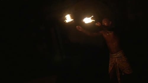 Impressive Man Performing a Fire Show at Night
