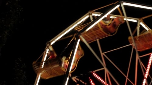 Of A Funfair Ride At Night