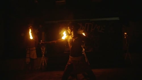 Talented Man Performs Fire Dancing at Night