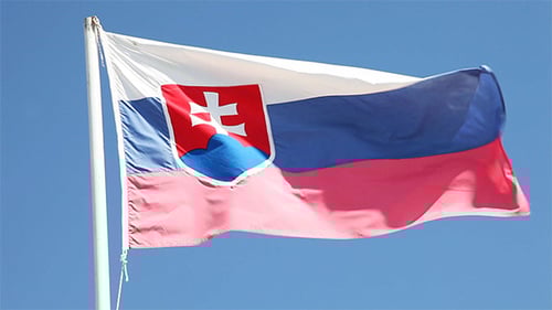 Slovakia Flag Waving Against Blue Sky