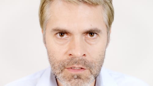 Close Up of Man Looking Straight at Camera