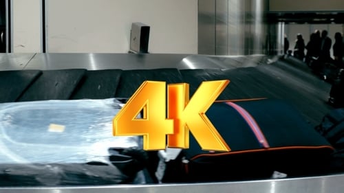 Travel Bags On The Conveyor Belt At Airport