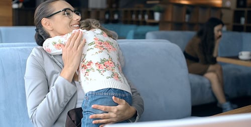 Geschäftsfrau und Mutter in einem