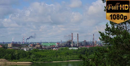 Factory Behind Lake and Tree