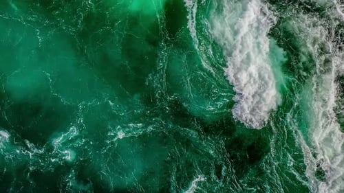 Waves of Water of the River and the Sea Meet Each Other During High Tide