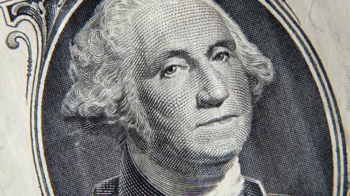 Nahaufnahme eines rotierenden Dollarscheins, ein Dollar eines US-Dollar-Scheins