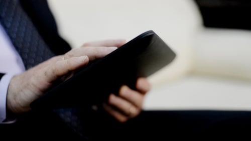 Hands Using Digital Tablet