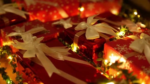 Christmas Presents Underneath Christmas Tree at Night